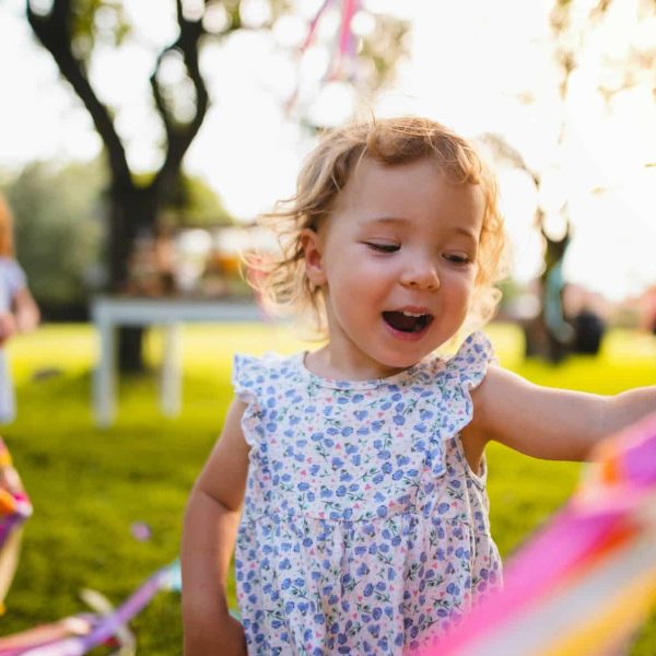a-front-view-of-small-girl-on-birthday-party-outdoors-in-garden-in-summer-.jpg a-front-view-of-small-girl-on-birthday-party-outdoors-in-garden-in-summer-.jpg